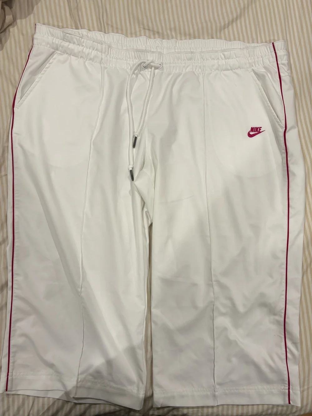cropped white nike track pants